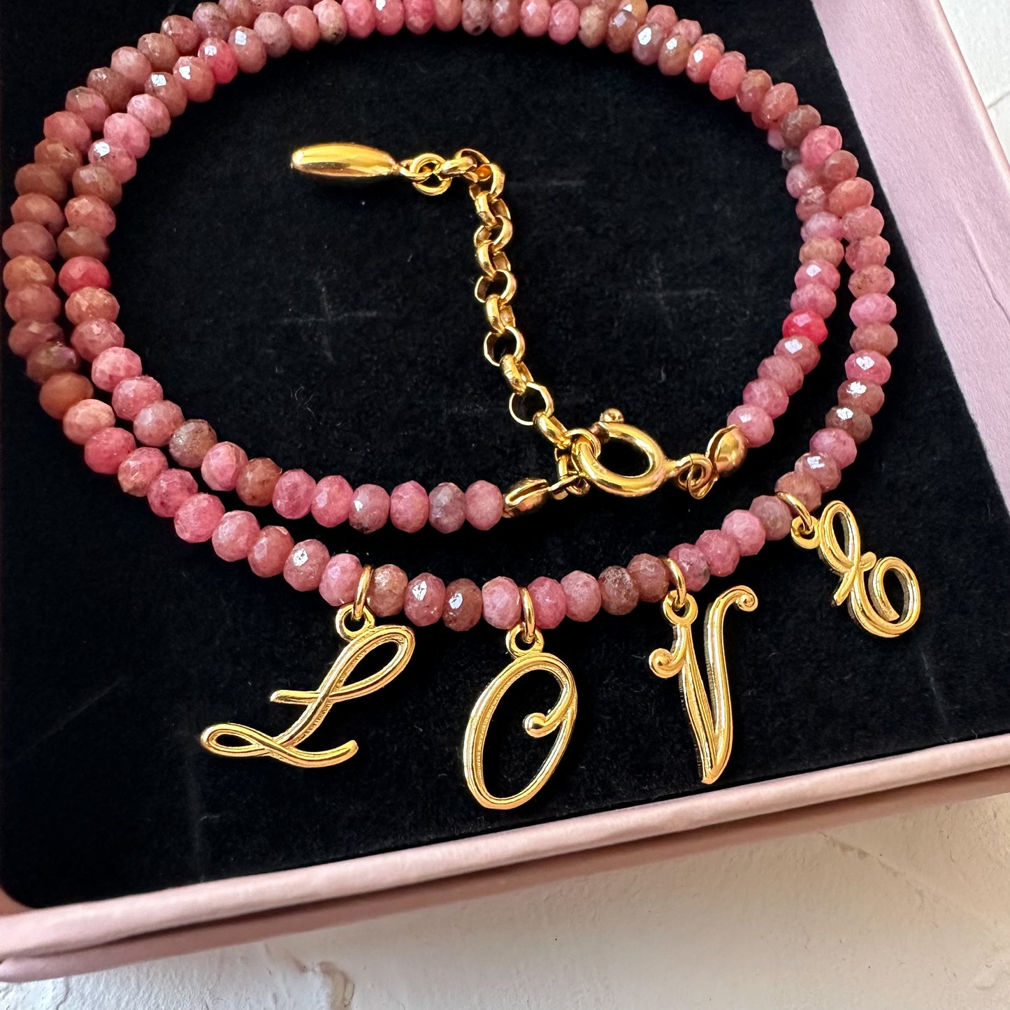 POWER OF LOVE NECKLACE gold-plated version with rhodochrosite stones and letter charms