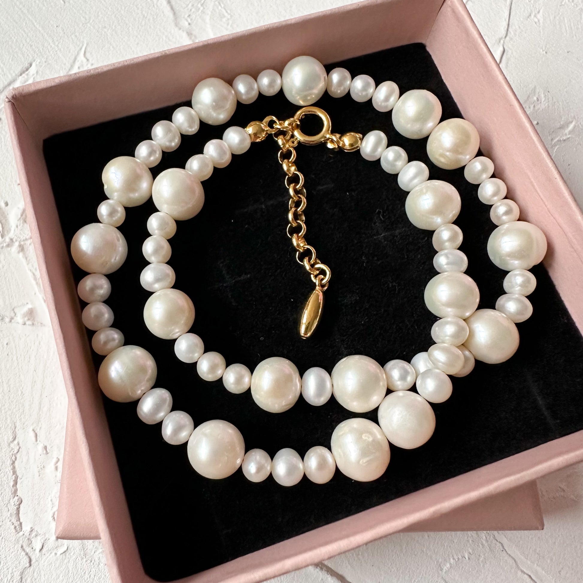 PEARLY NECKLACE close-up showing different pearl sizes and organic texture